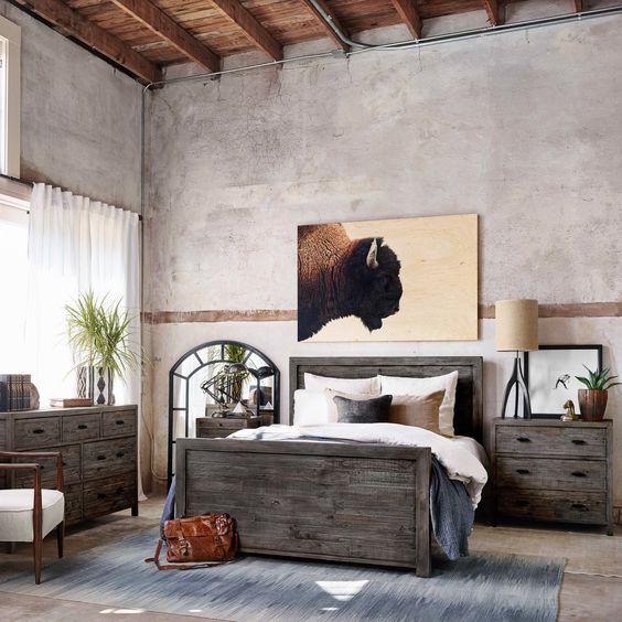 Dormitorio de hombres simplificado con una imagen de un toro.